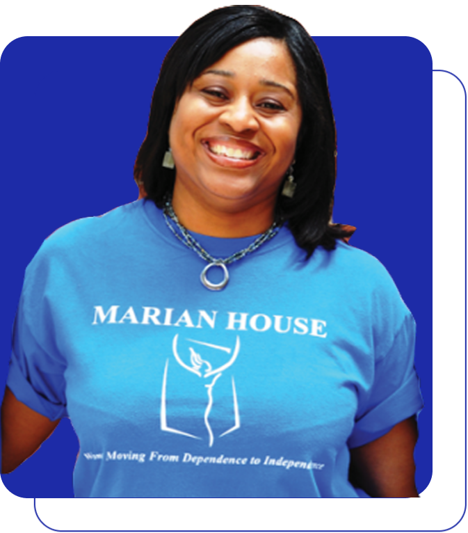 Smiling female african american volunteer wearing marian house t-shirt.